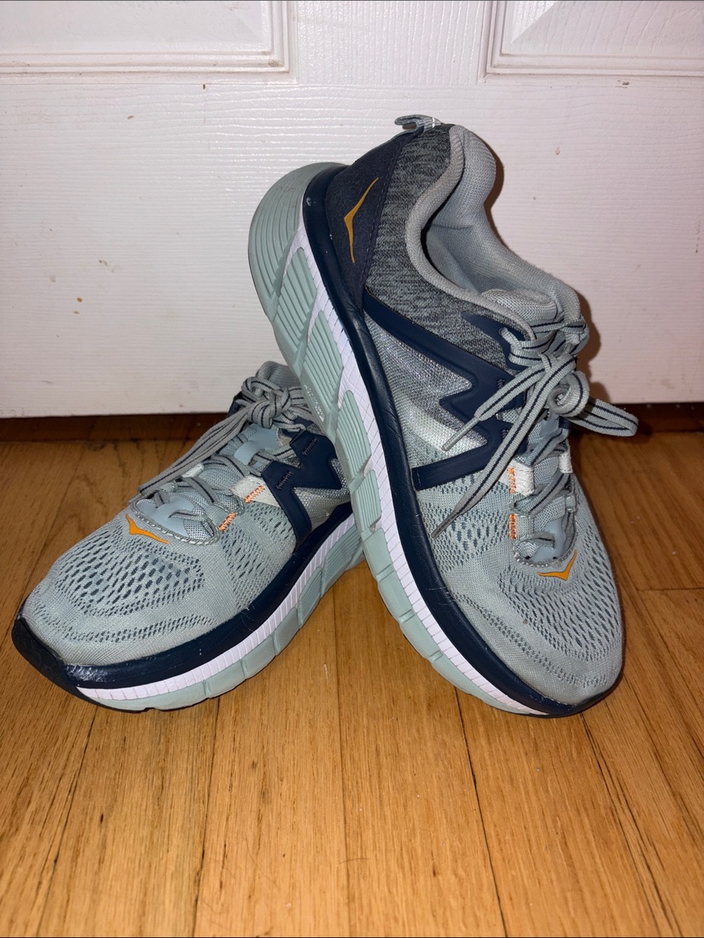 Light Blue Athletic Running Shoes with Navy Accents - Women's